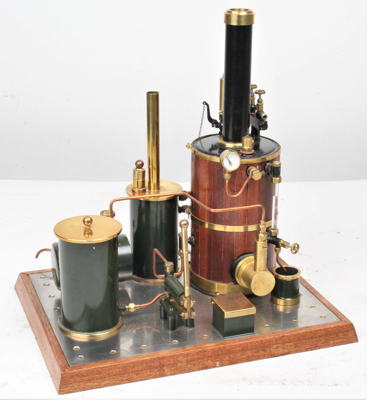 Gas-fired vertical boiler with hand pump and water tank