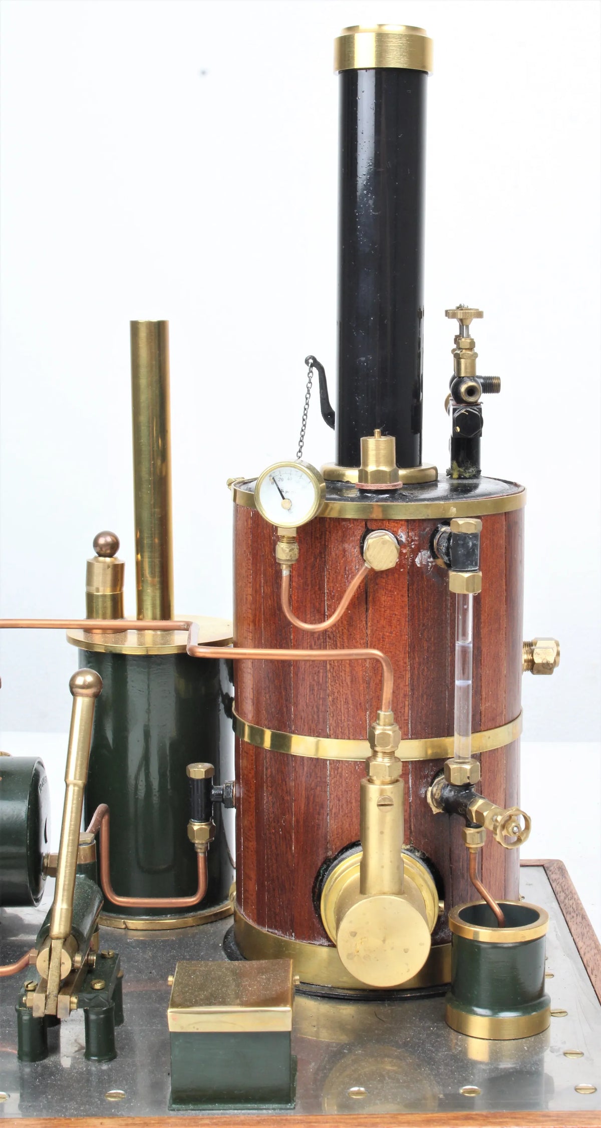 Gas-fired vertical boiler with hand pump and water tank