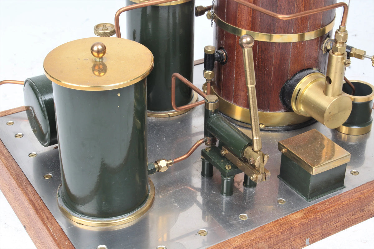 Gas-fired vertical boiler with hand pump and water tank