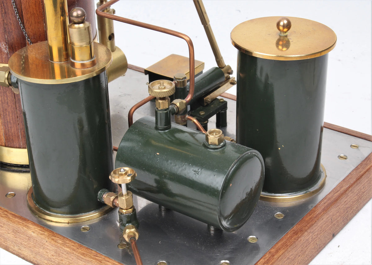 Gas-fired vertical boiler with hand pump and water tank