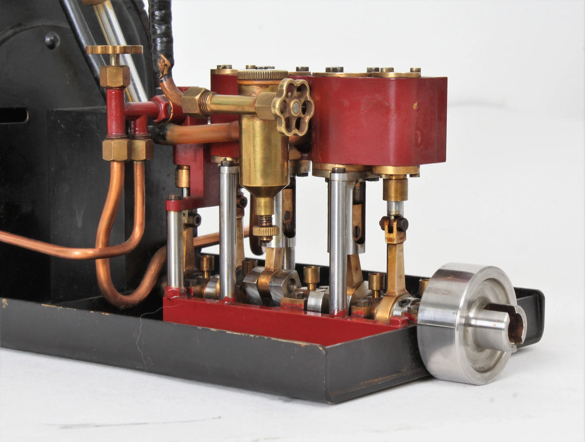 Gas-fired marine steam plant with reversing twin engine