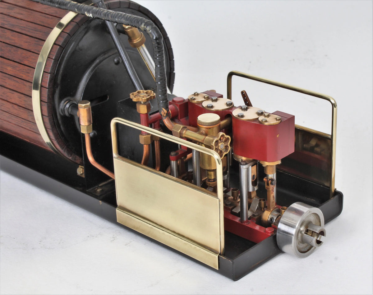 Gas-fired marine steam plant with reversing twin engine