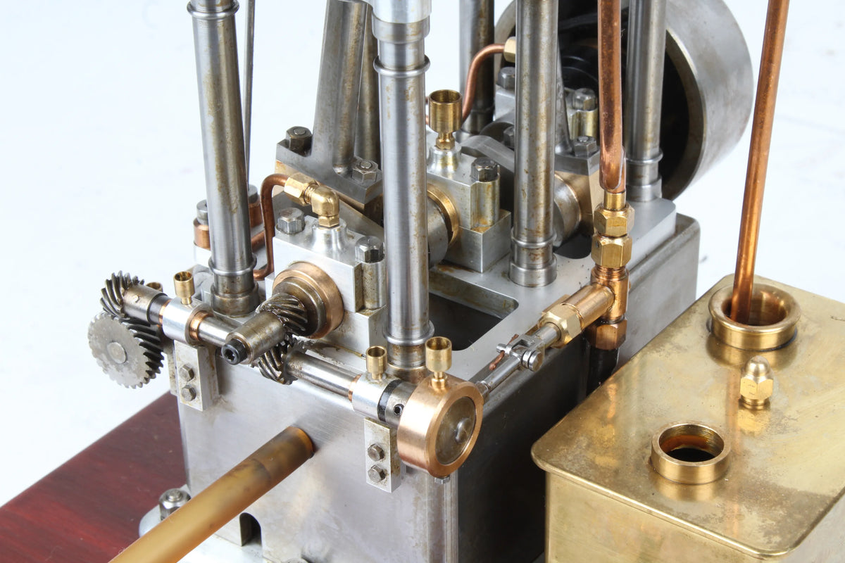 Open crank vertical twin internal combustion engine