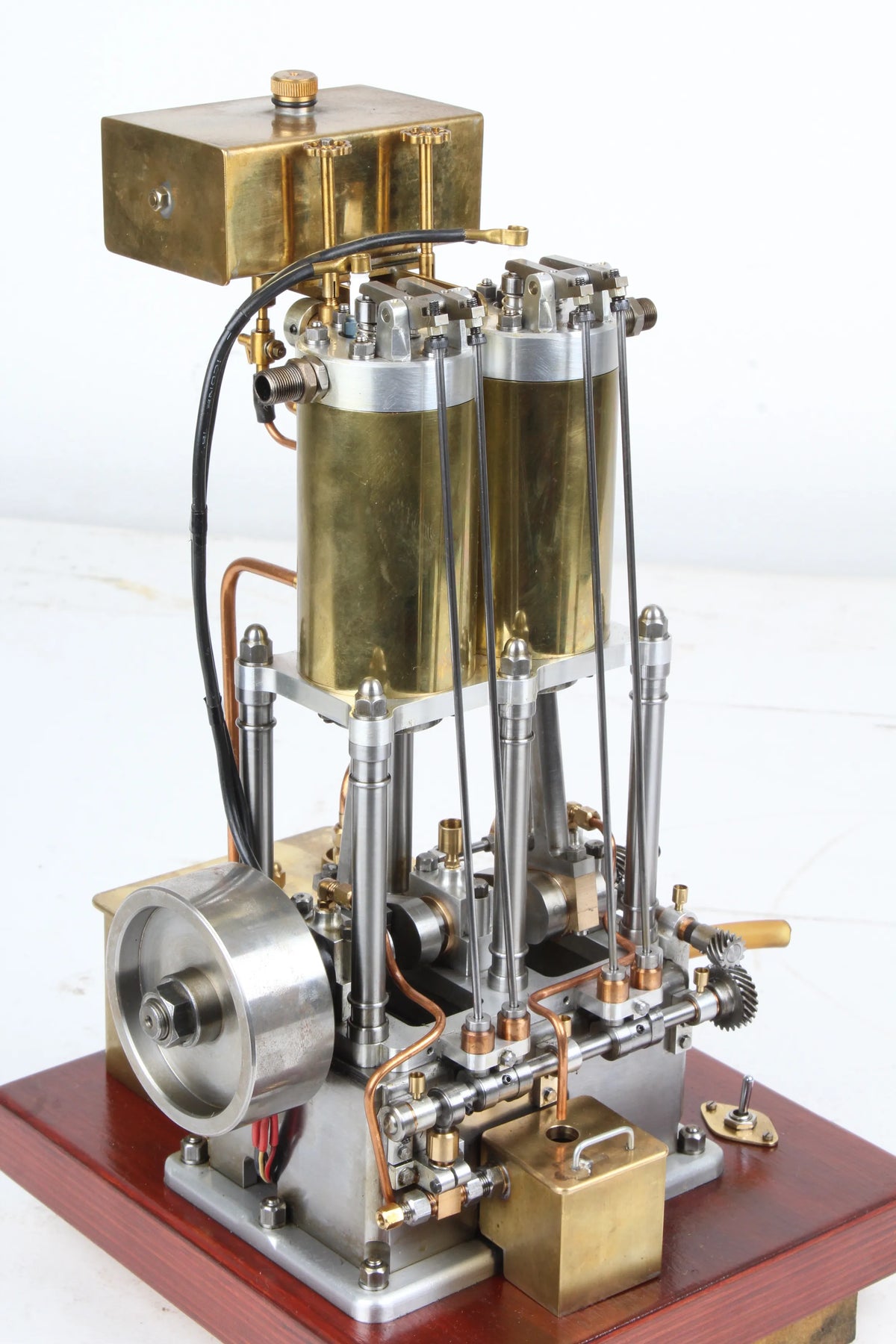 Open crank vertical twin internal combustion engine