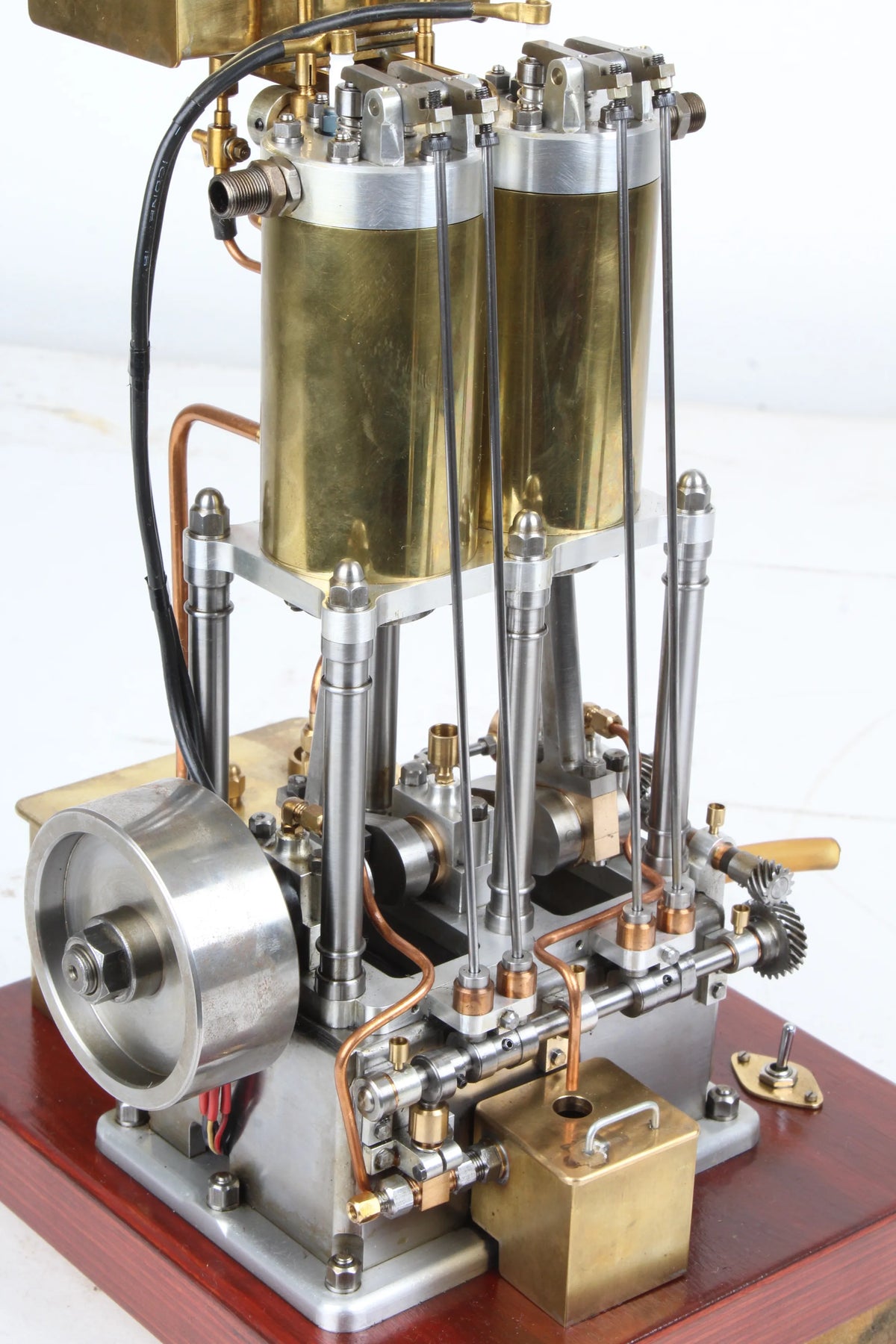 Open crank vertical twin internal combustion engine