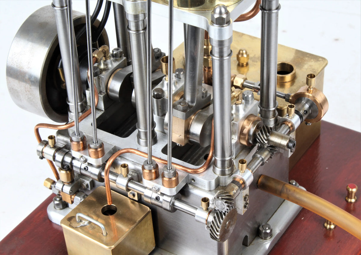 Open crank vertical twin internal combustion engine