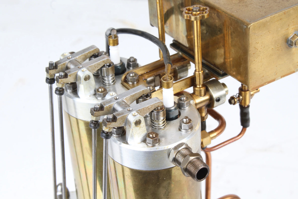 Open crank vertical twin internal combustion engine