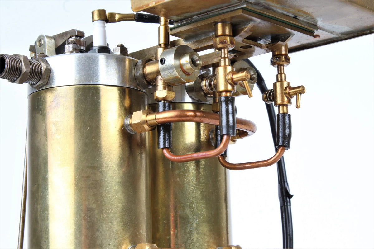 Open crank vertical twin internal combustion engine
