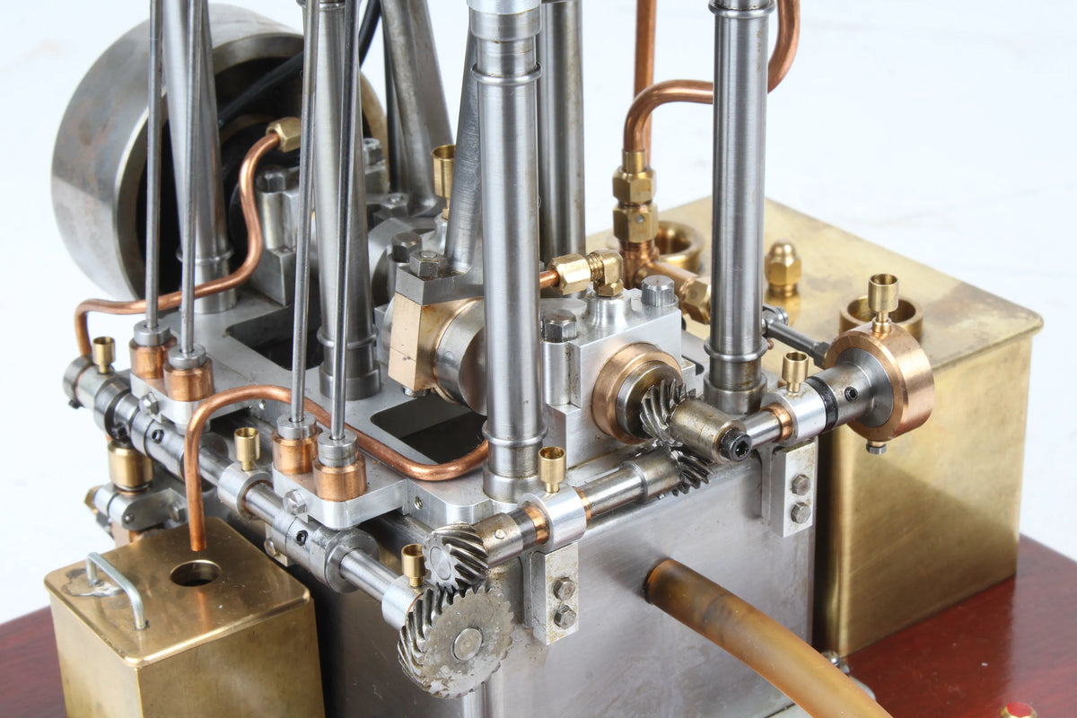 Open crank vertical twin internal combustion engine