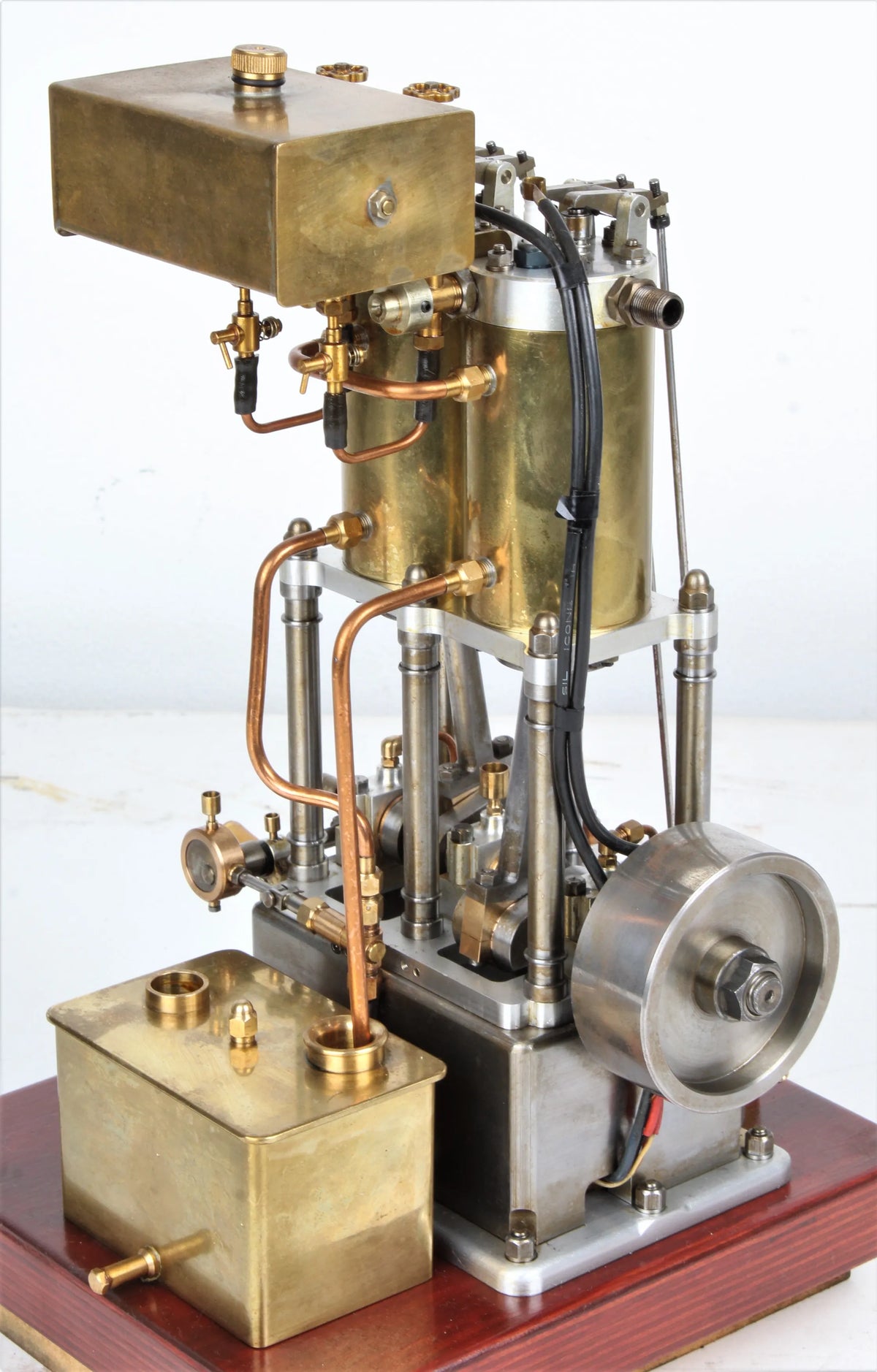 Open crank vertical twin internal combustion engine