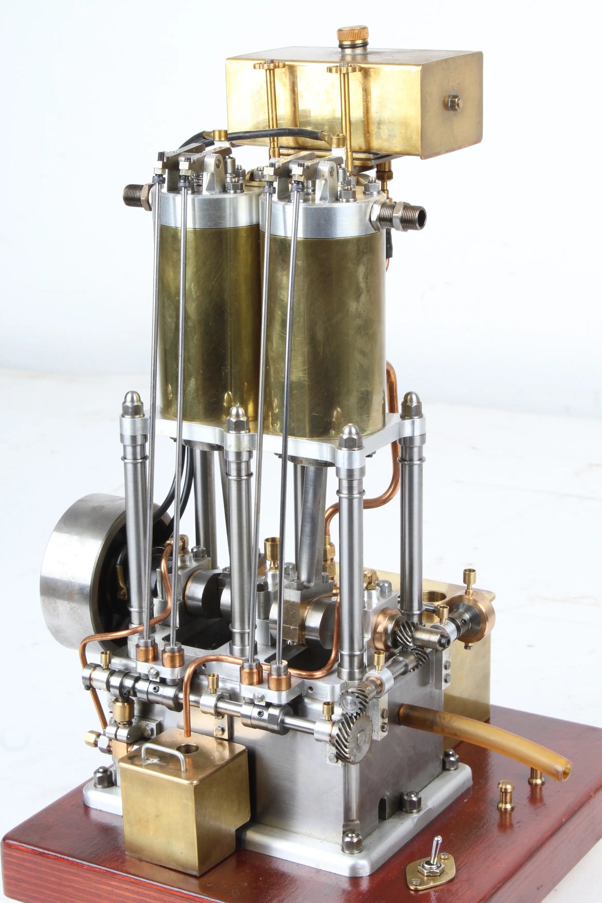 Open crank vertical twin internal combustion engine
