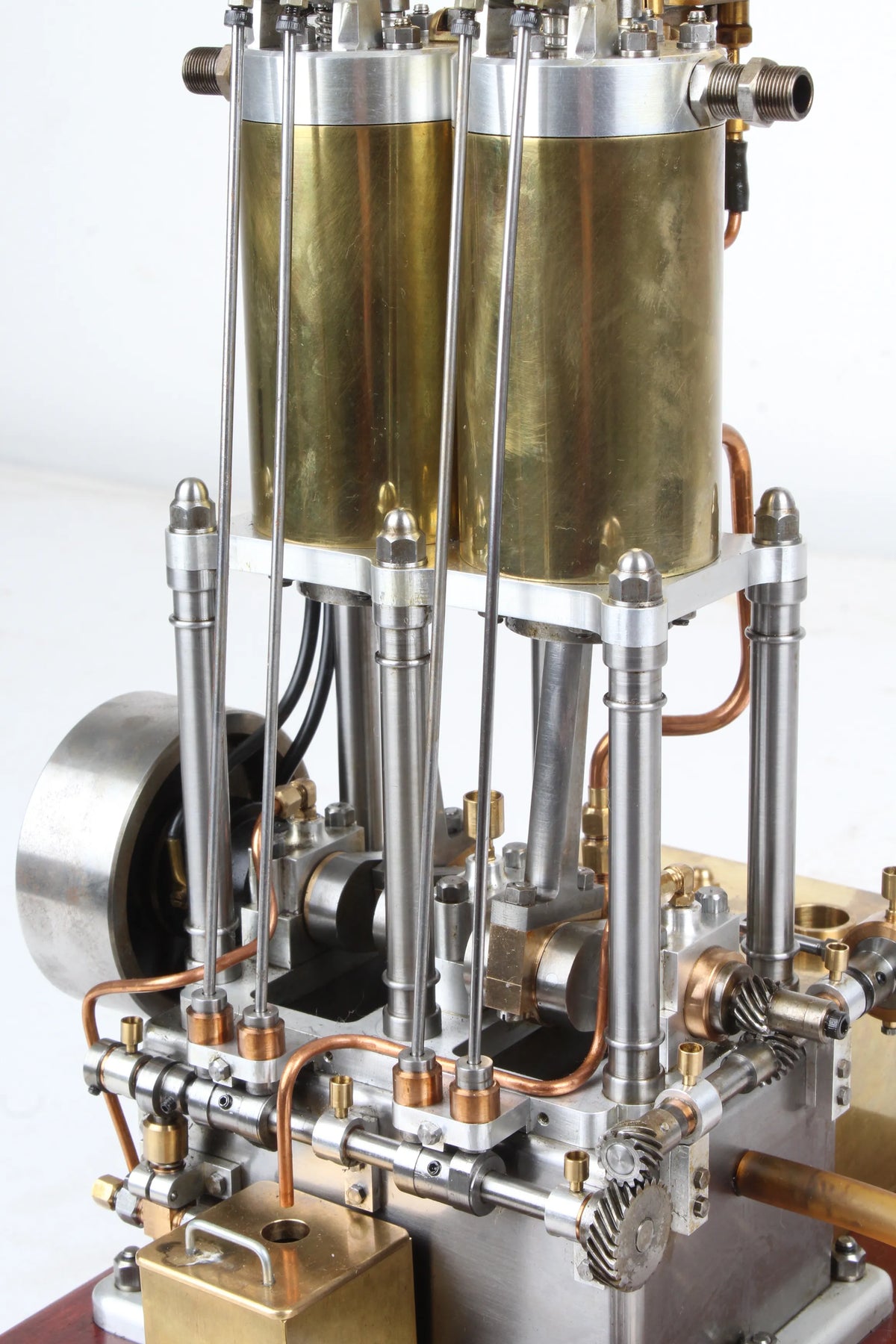 Open crank vertical twin internal combustion engine