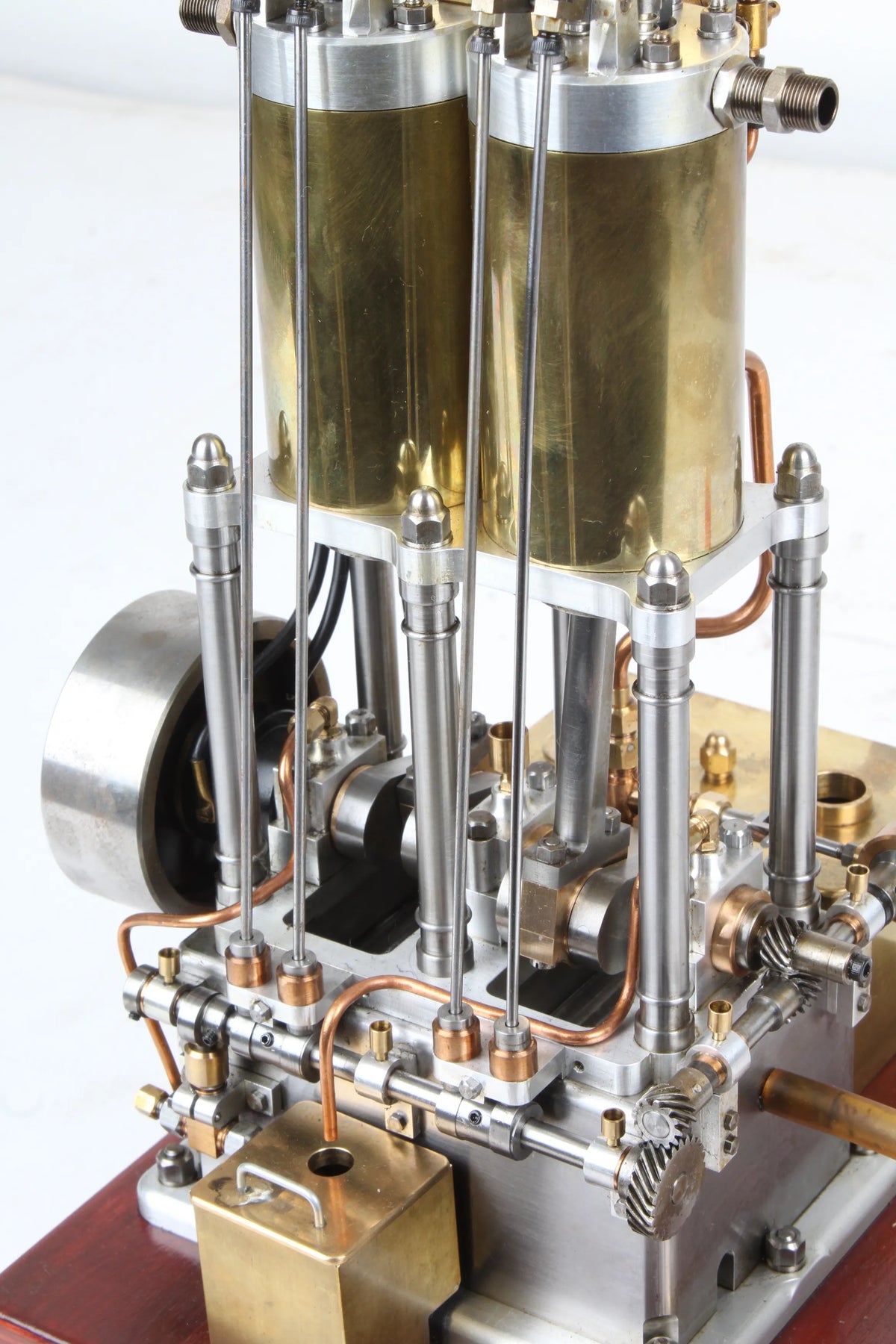 Open crank vertical twin internal combustion engine