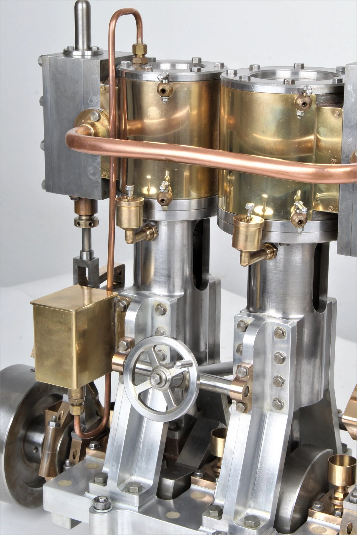 Vertical compound engine with reversing gear