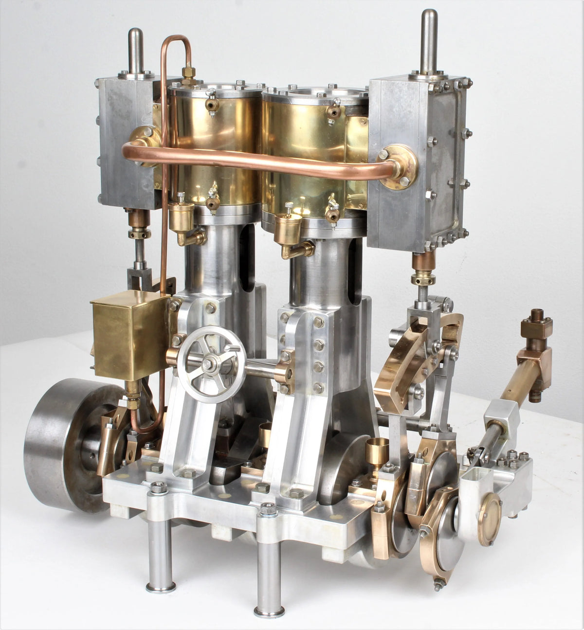 Vertical compound engine with reversing gear