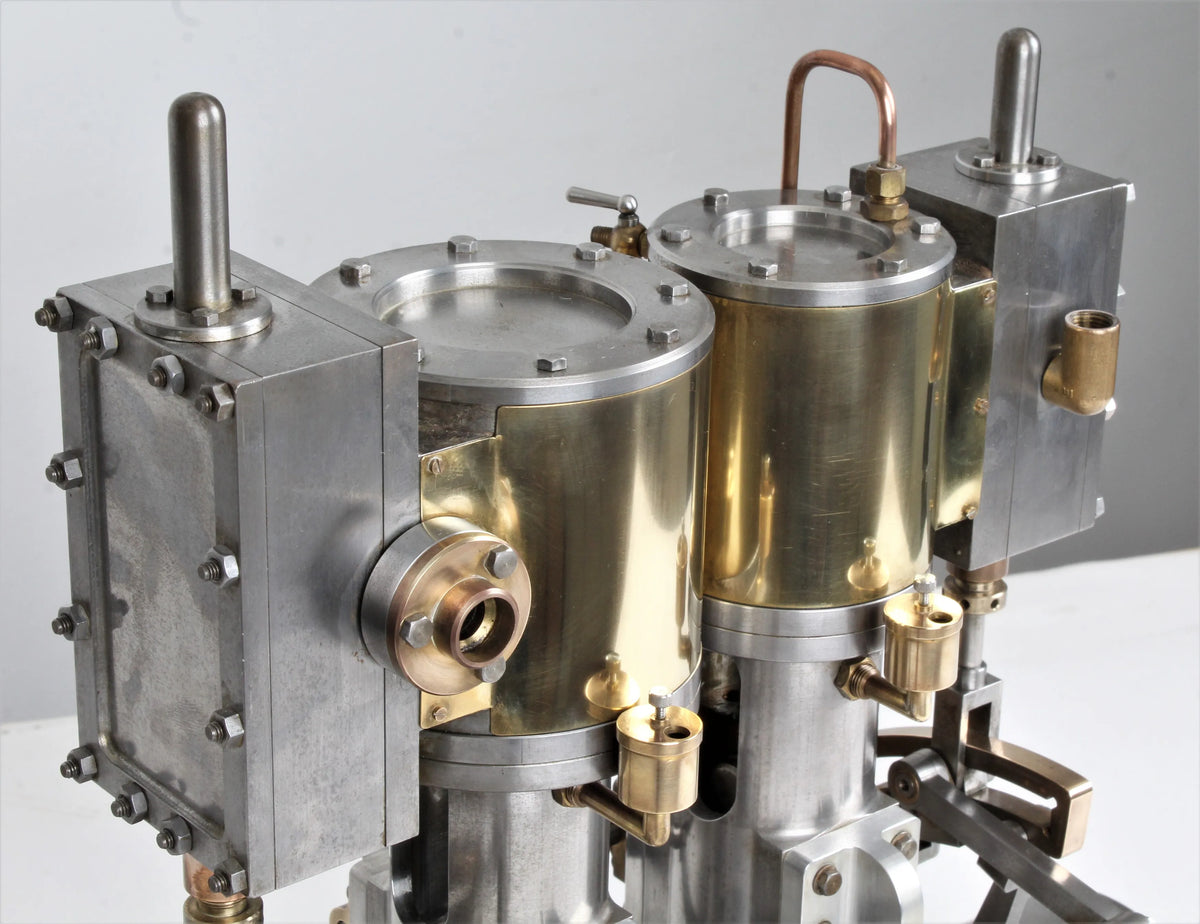 Vertical compound engine with reversing gear