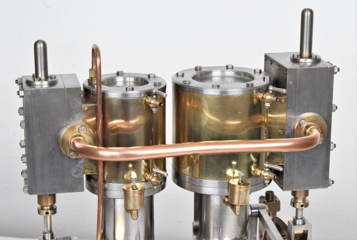 Vertical compound engine with reversing gear