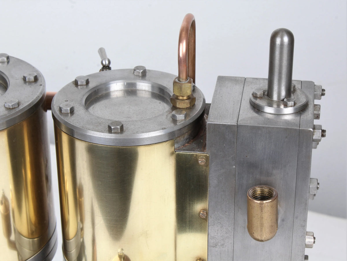 Vertical compound engine with reversing gear