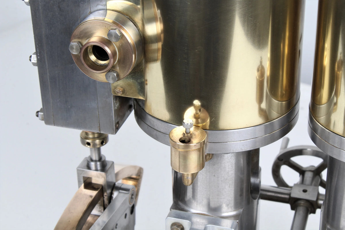 Vertical compound engine with reversing gear