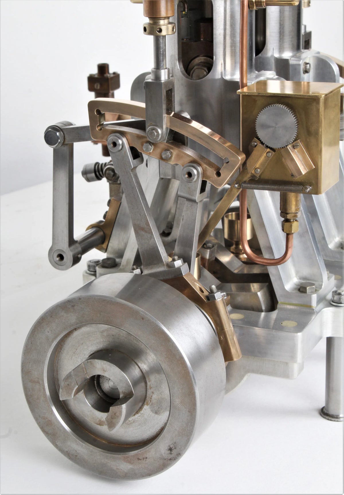 Vertical compound engine with reversing gear