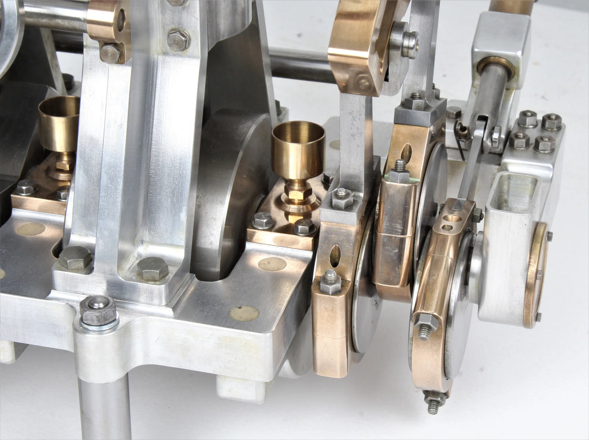 Vertical compound engine with reversing gear