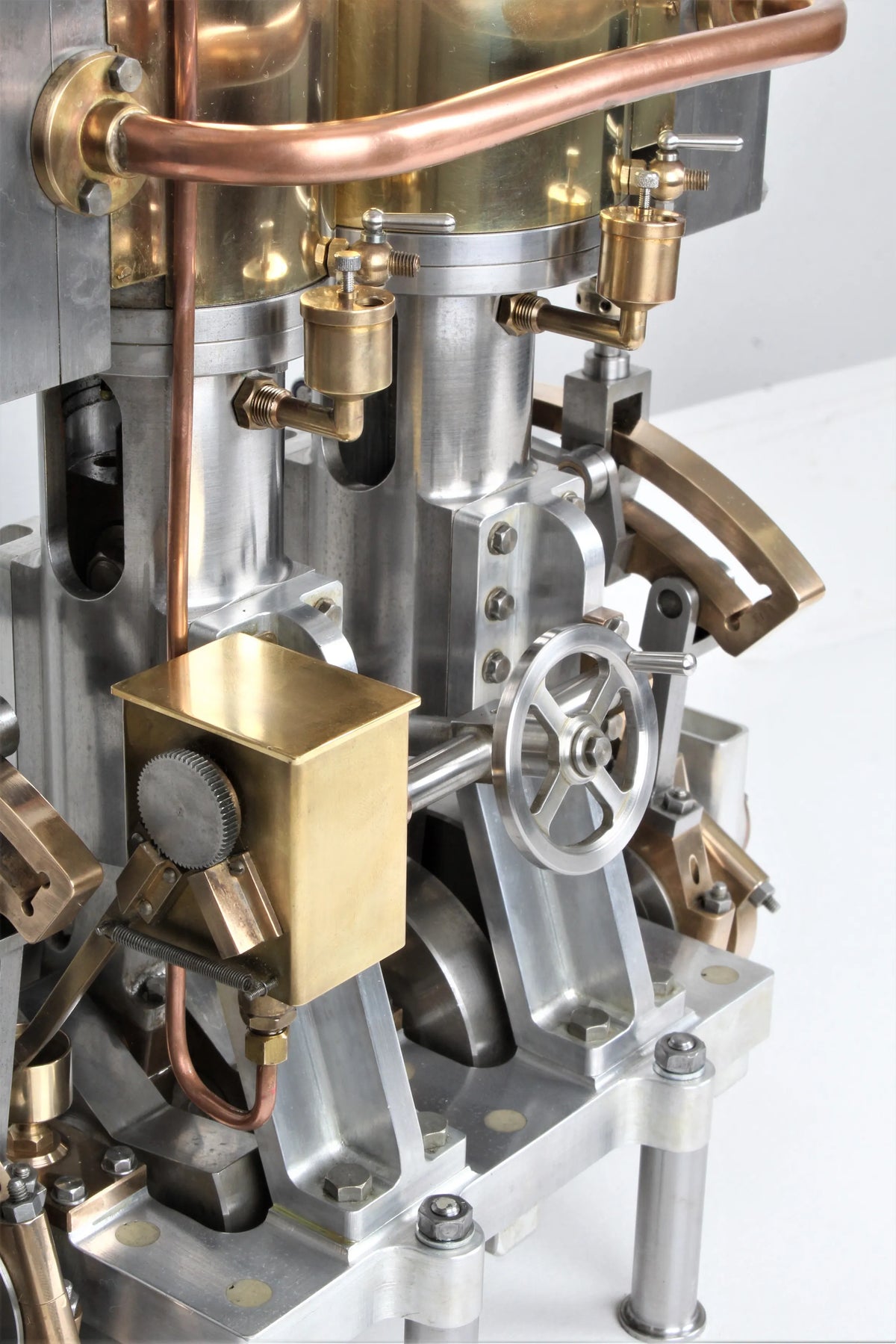 Vertical compound engine with reversing gear