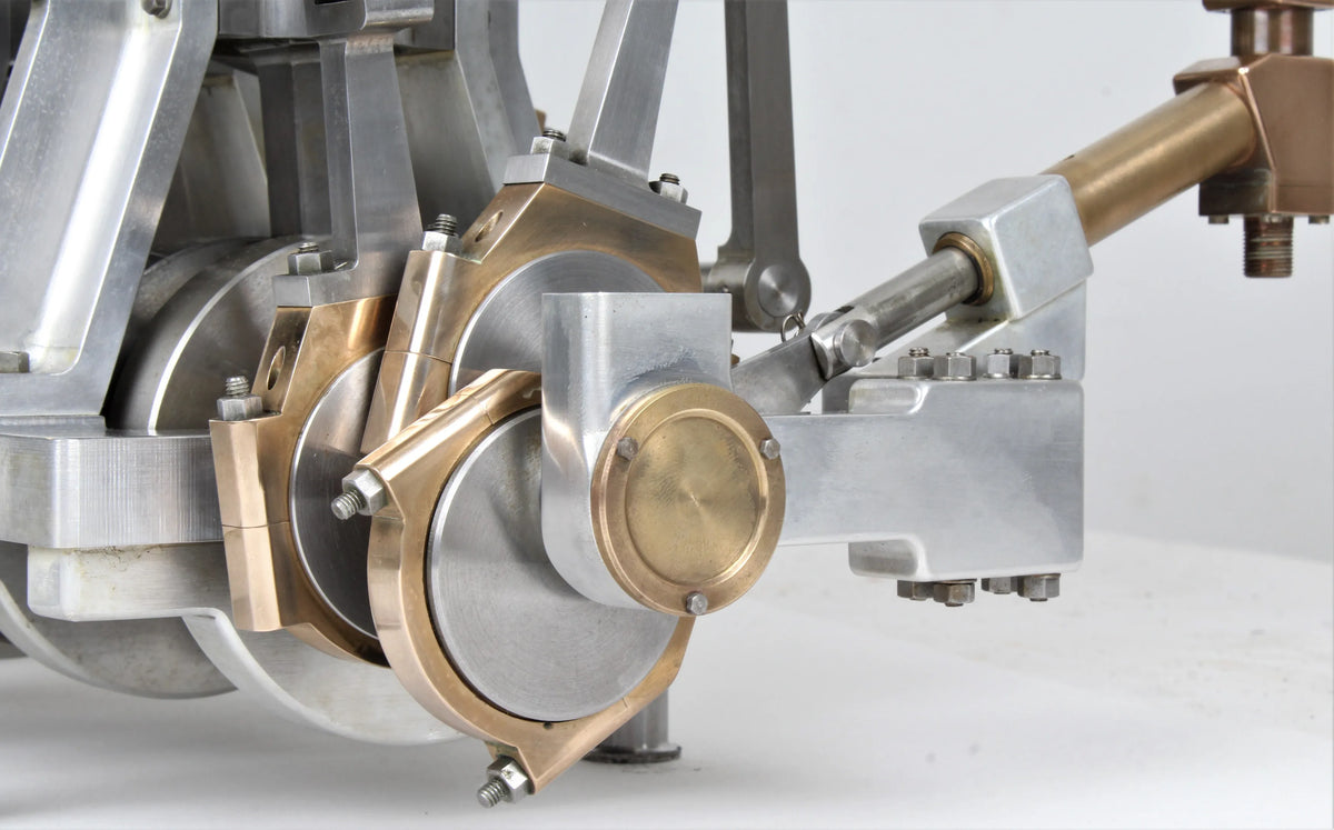 Vertical compound engine with reversing gear