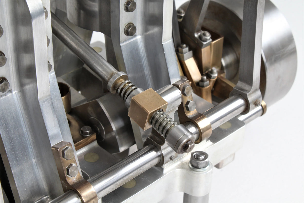 Vertical compound engine with reversing gear