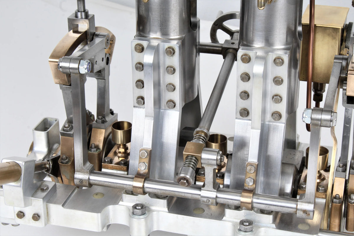 Vertical compound engine with reversing gear