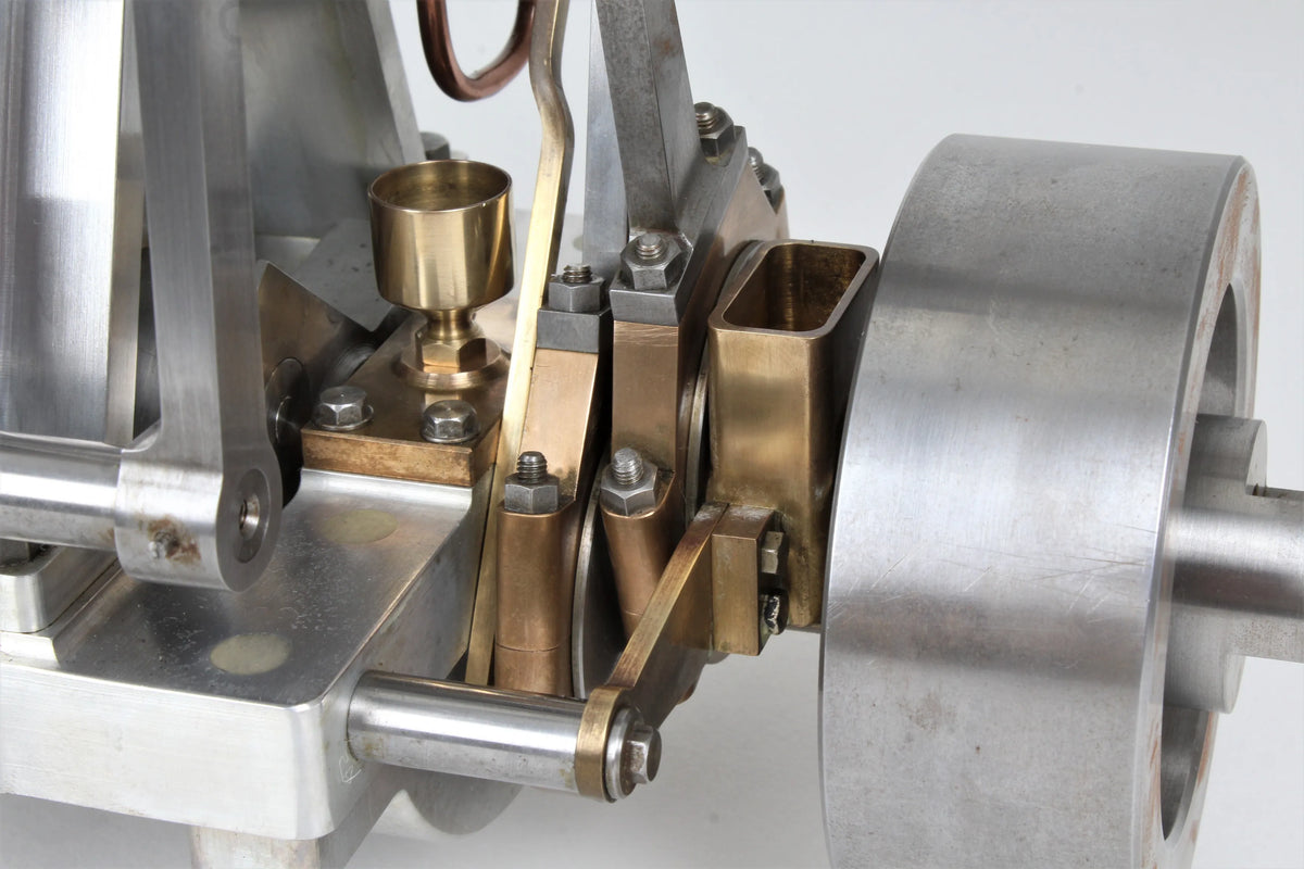 Vertical compound engine with reversing gear