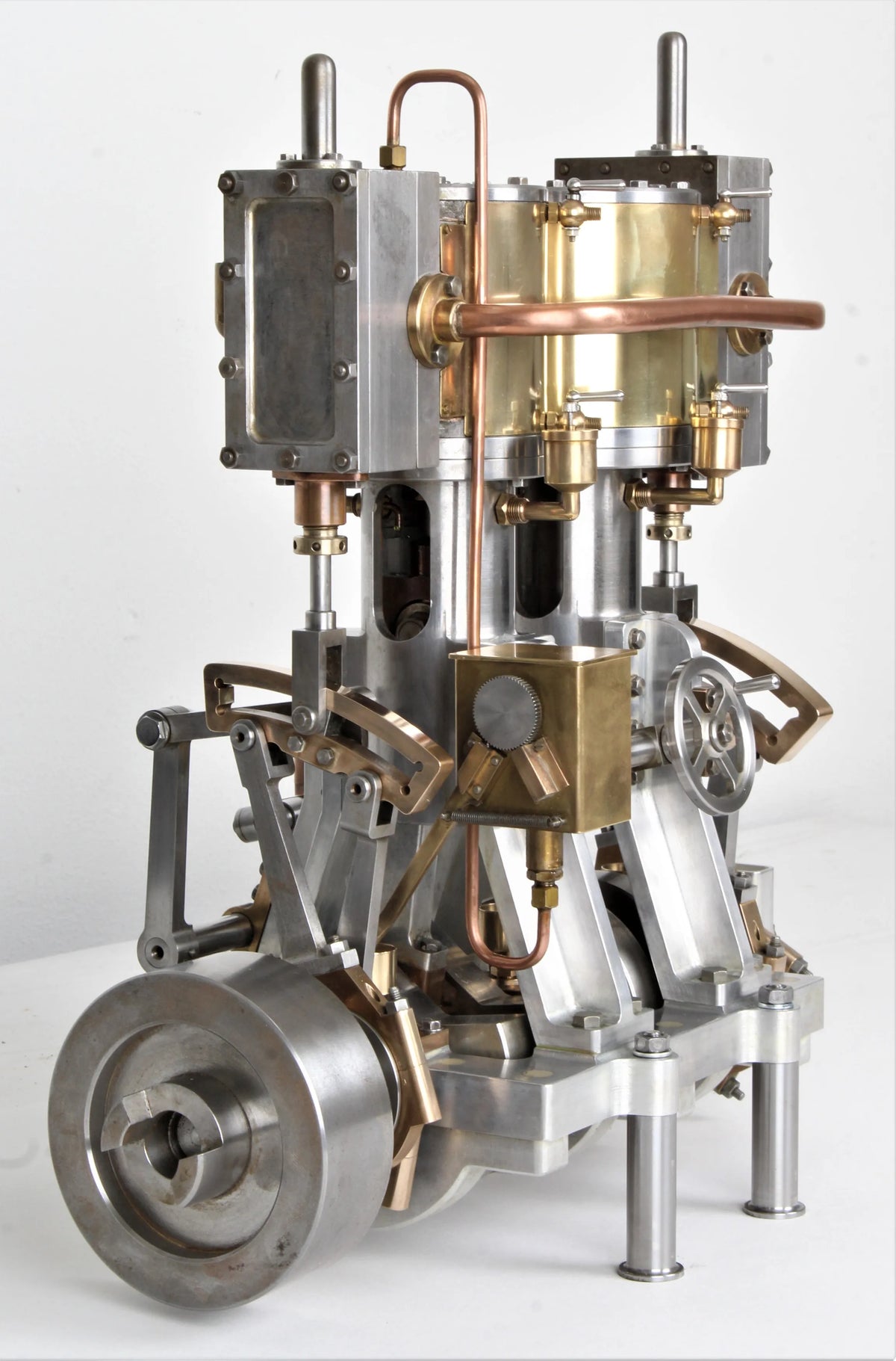 Vertical compound engine with reversing gear