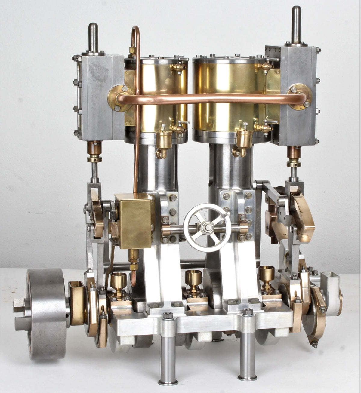 Vertical compound engine with reversing gear