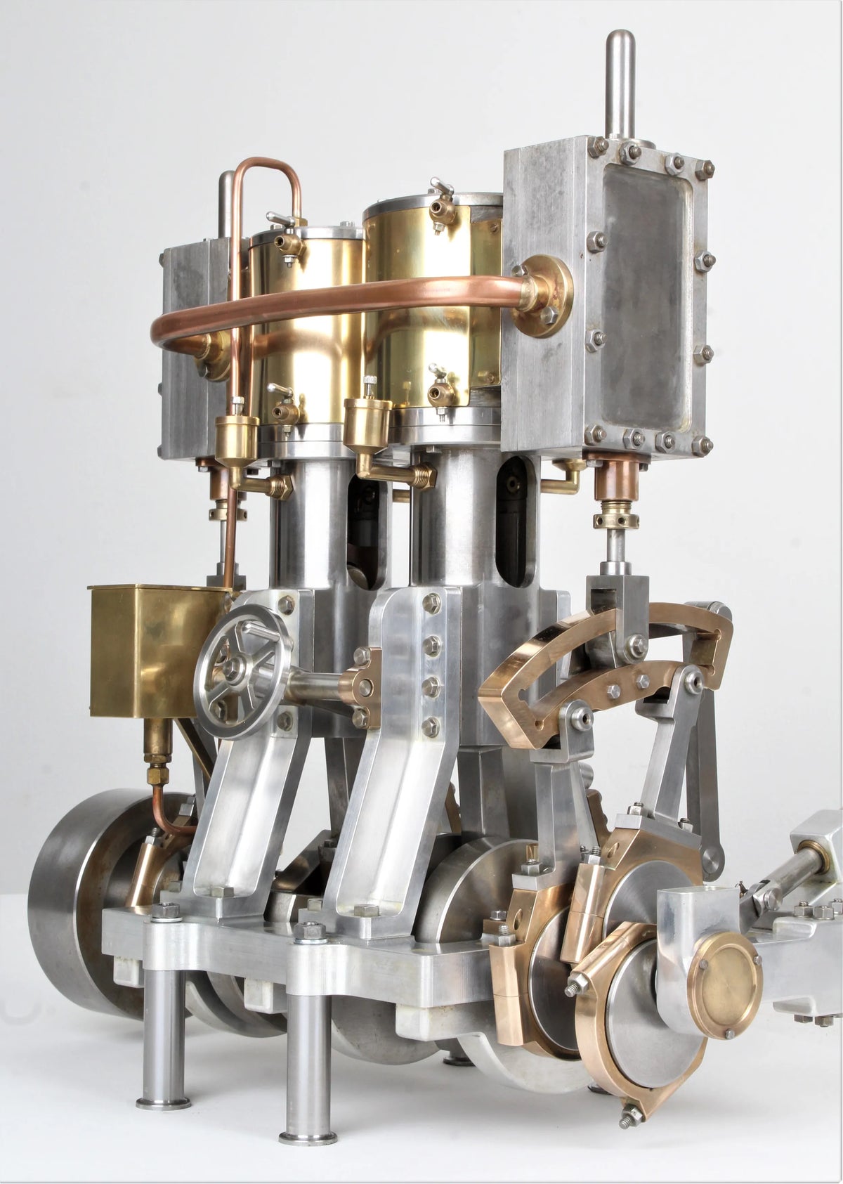 Vertical compound engine with reversing gear