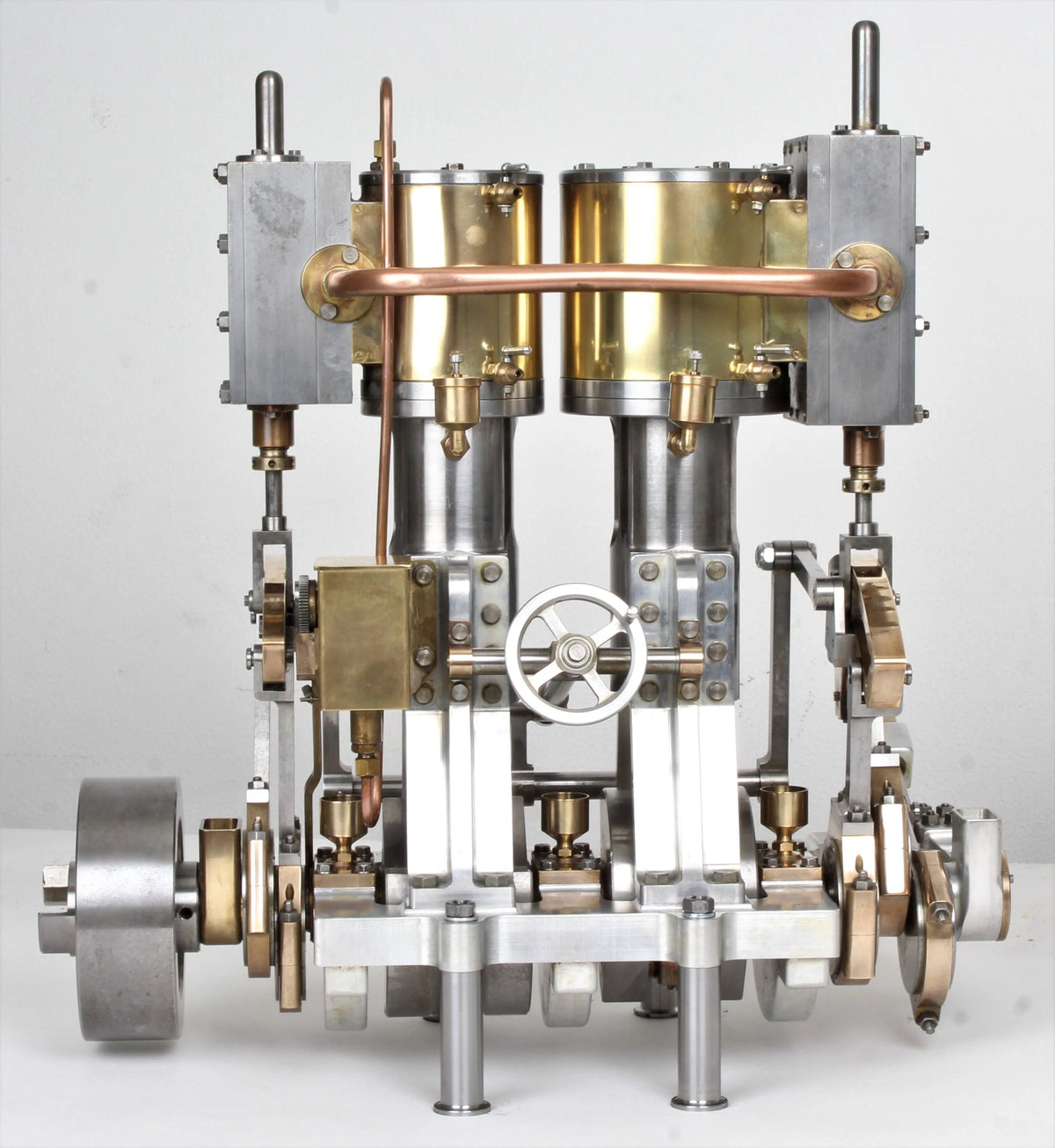 Vertical compound engine with reversing gear