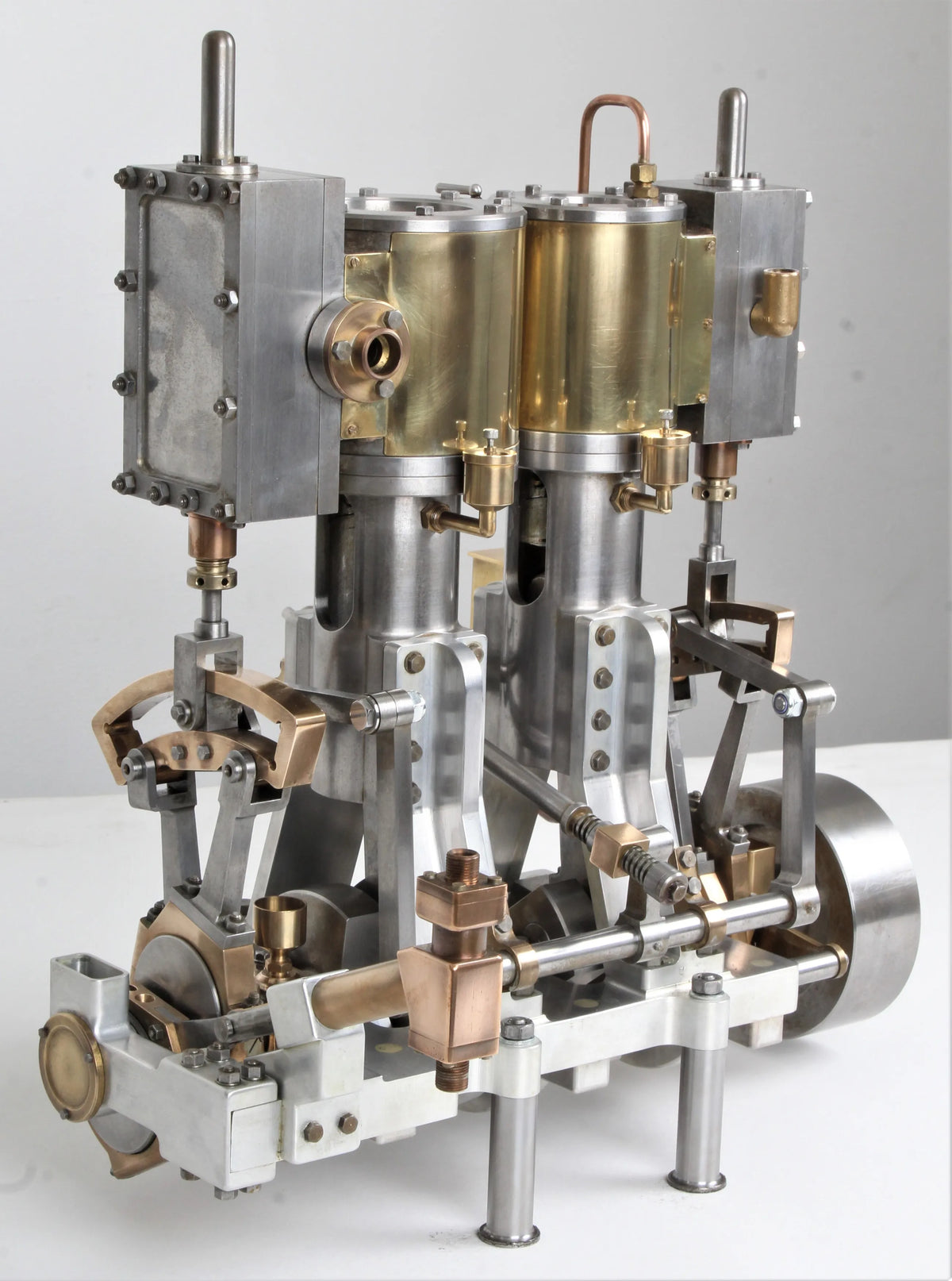 Vertical compound engine with reversing gear