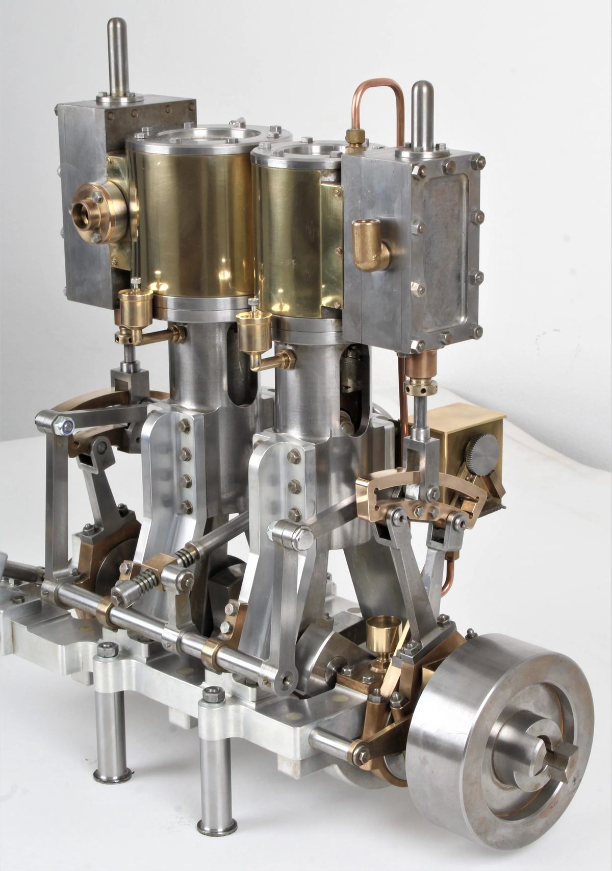 Vertical compound engine with reversing gear