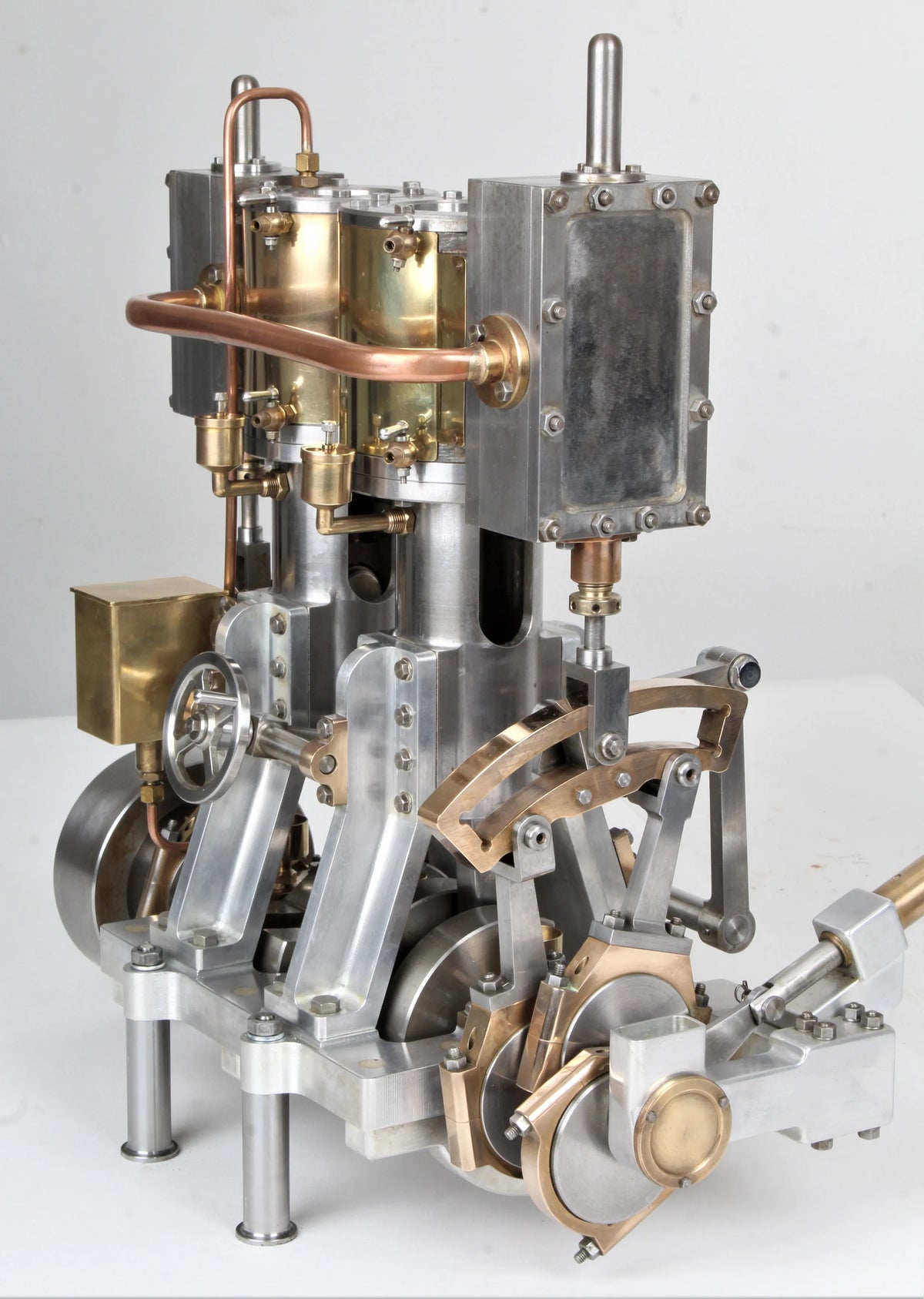 Vertical compound engine with reversing gear