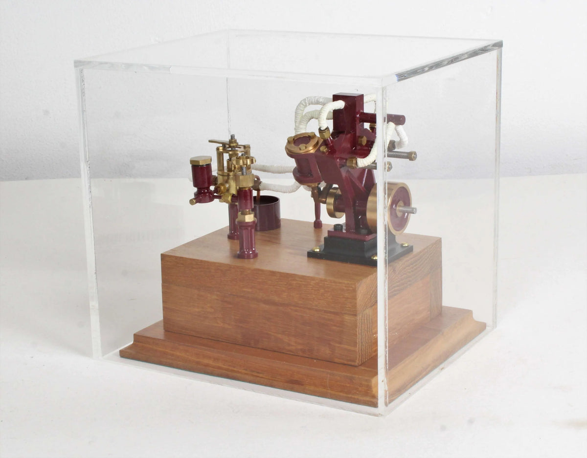 Twin oscillating engine on oak plinth