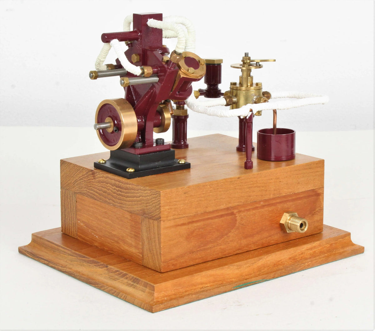 Twin oscillating engine on oak plinth