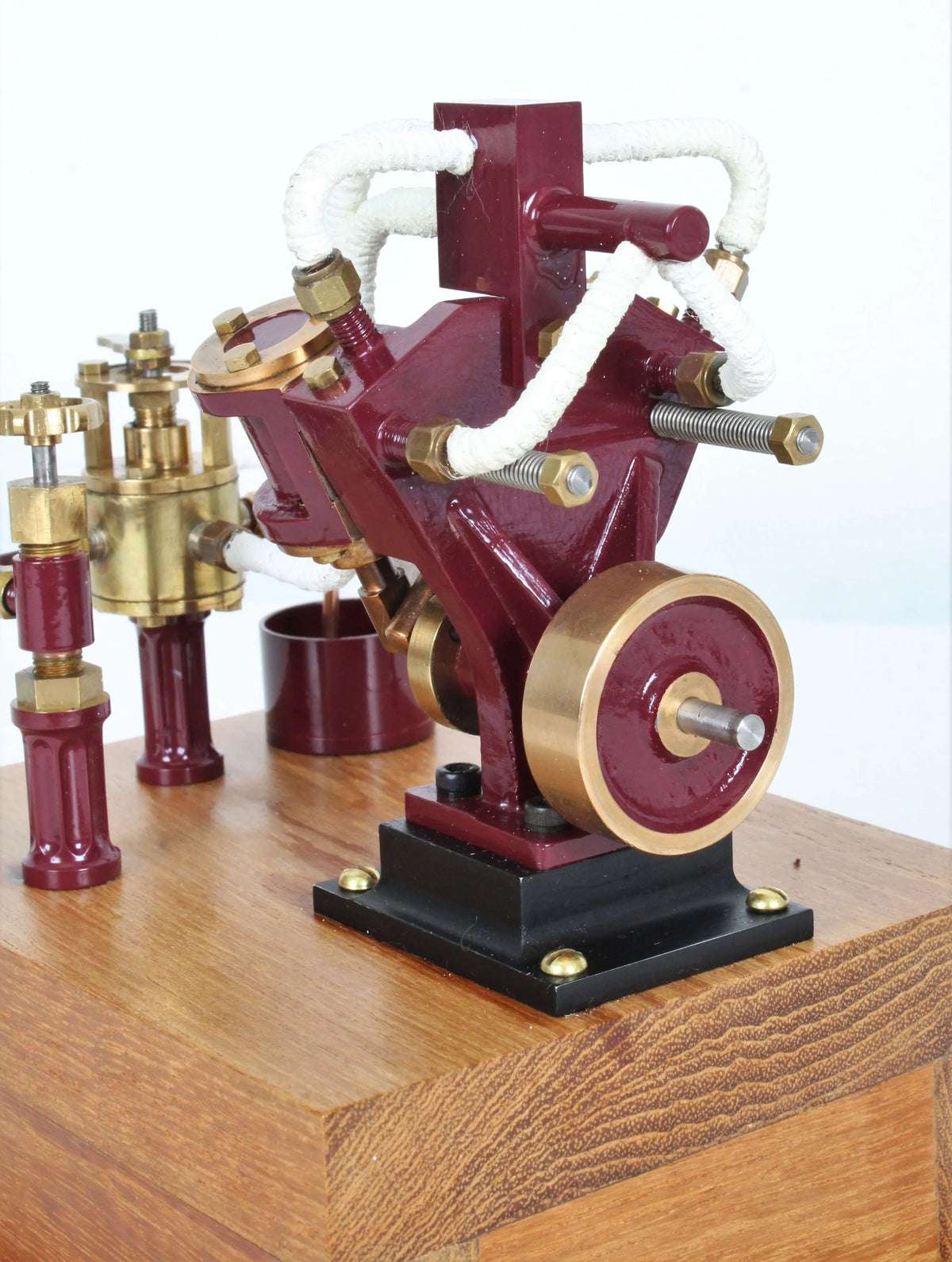 Twin oscillating engine on oak plinth
