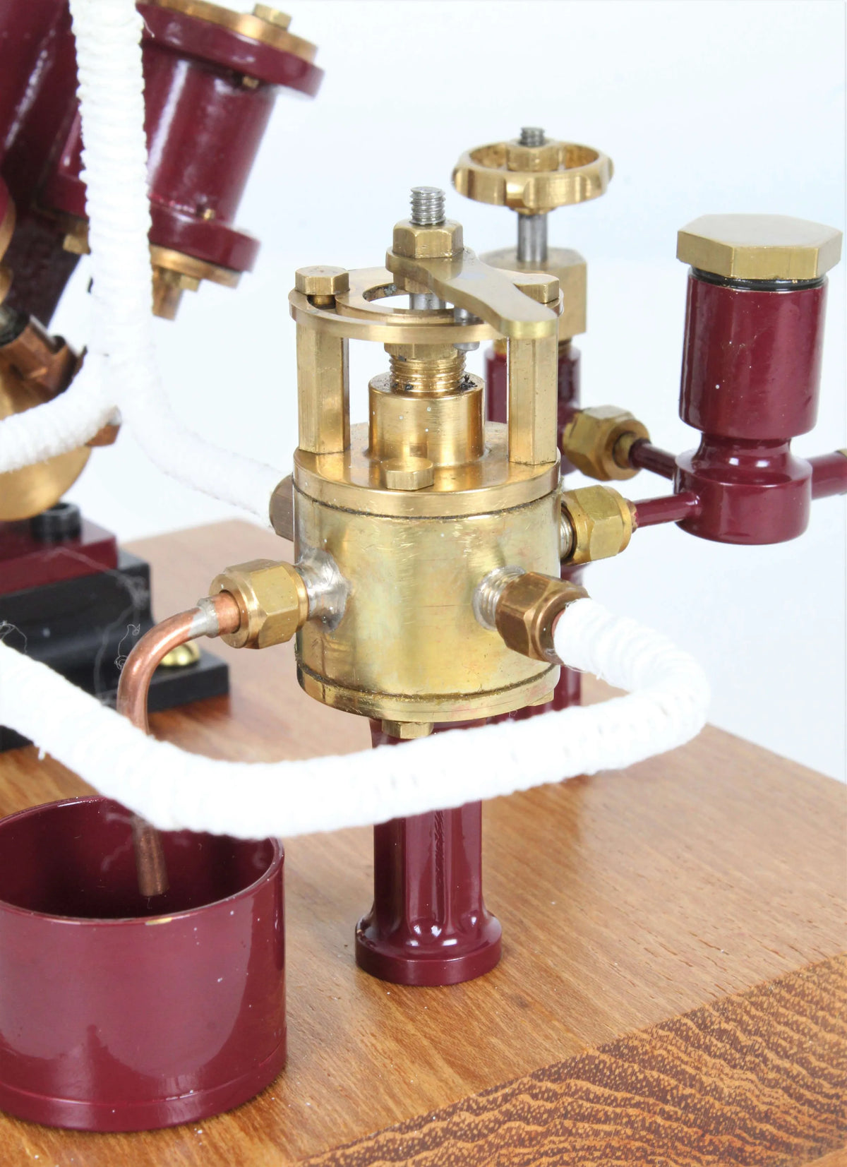 Twin oscillating engine on oak plinth