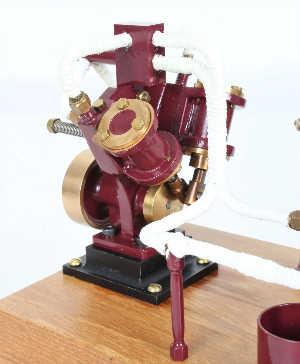 Twin oscillating engine on oak plinth