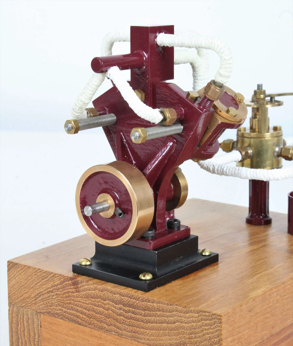 Twin oscillating engine on oak plinth