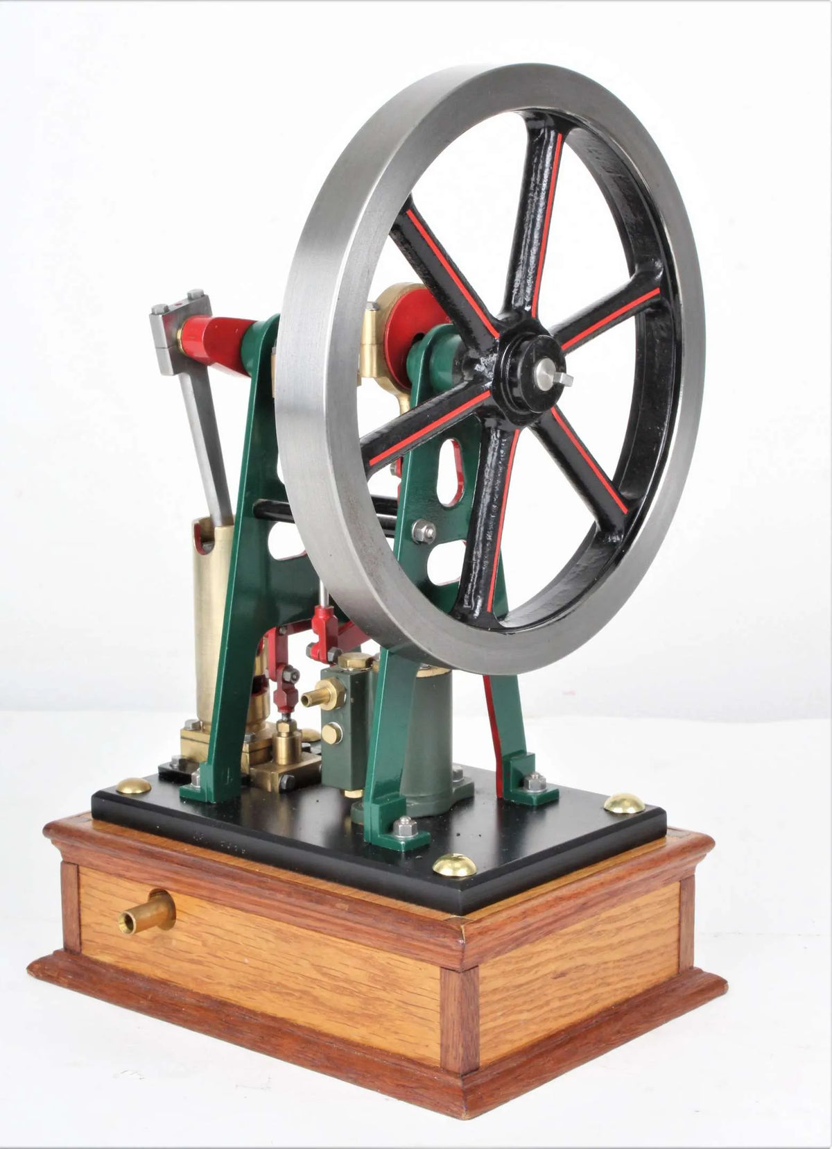 Vertical engine with pump on hardwood base