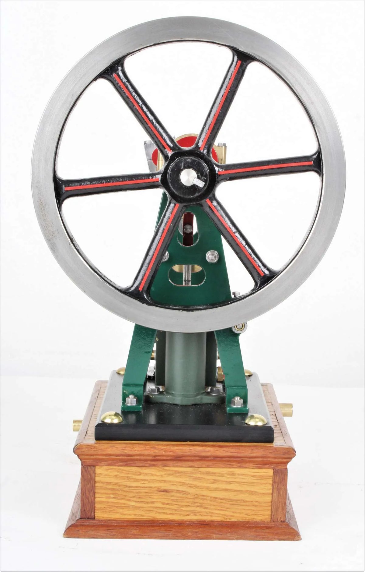 Vertical engine with pump on hardwood base