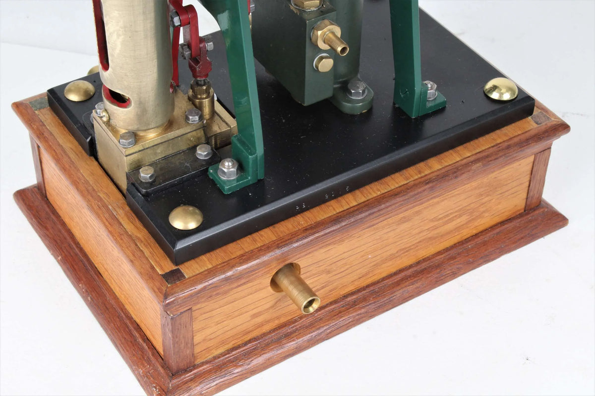 Vertical engine with pump on hardwood base