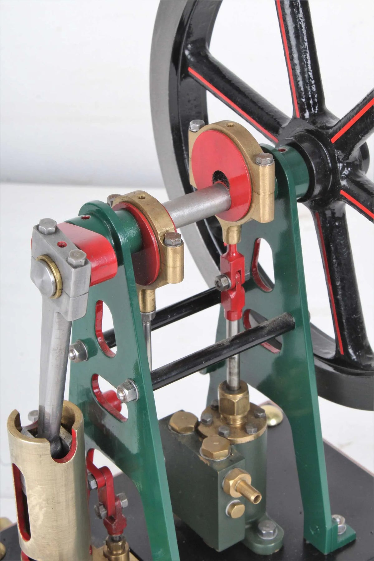 Vertical engine with pump on hardwood base