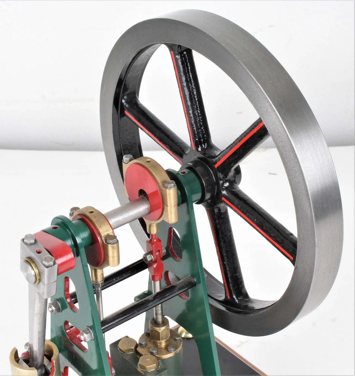 Vertical engine with pump on hardwood base